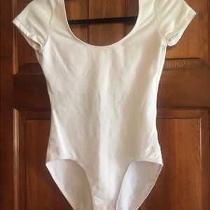 White danskin low back onesie